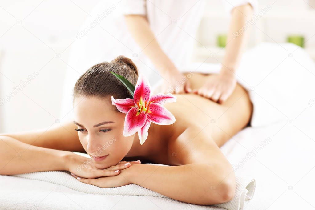 woman getting massage in spa