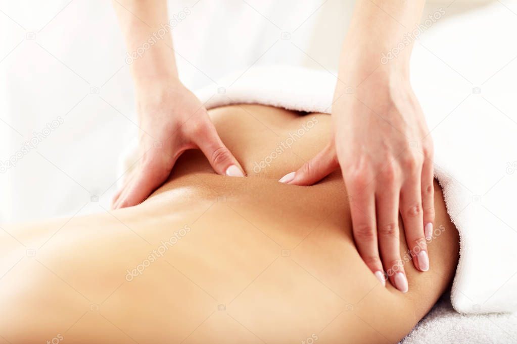 woman getting massage in spa