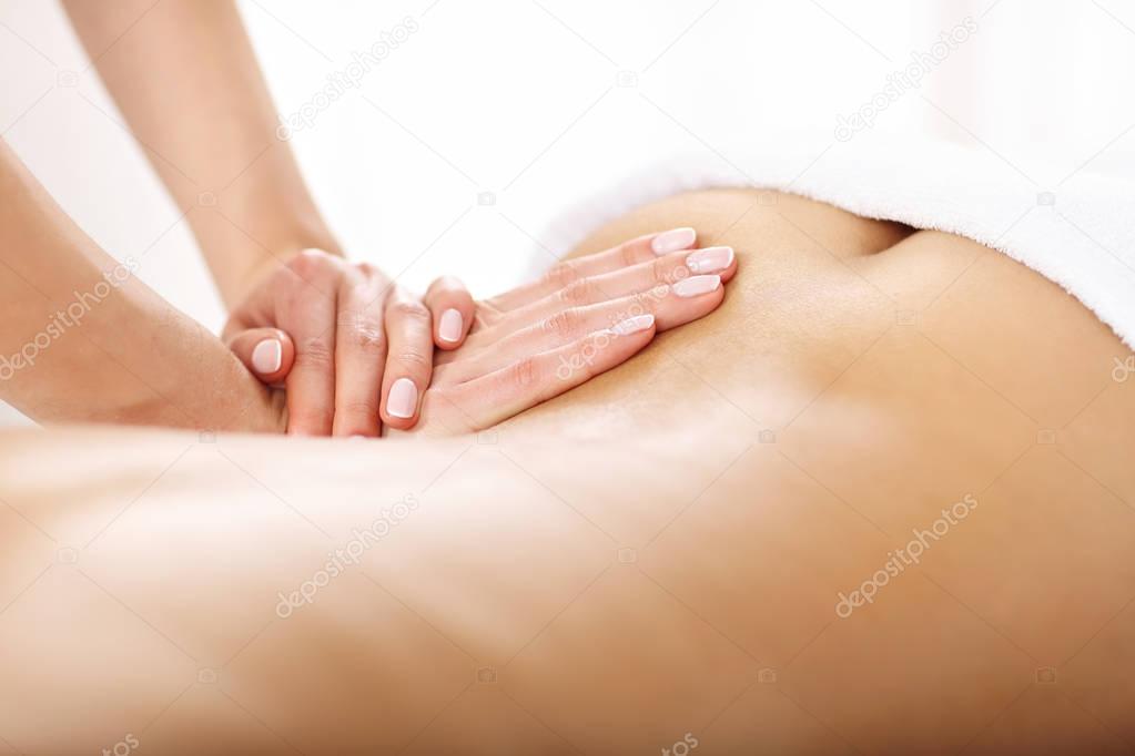  woman getting massage in spa