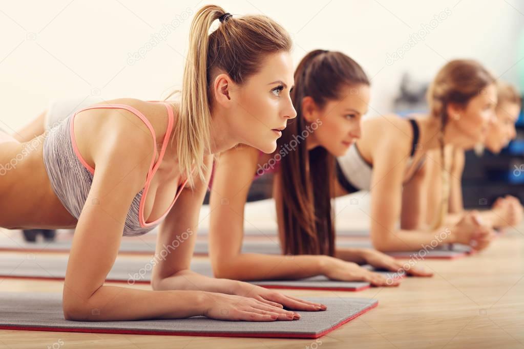 Young women doing plank