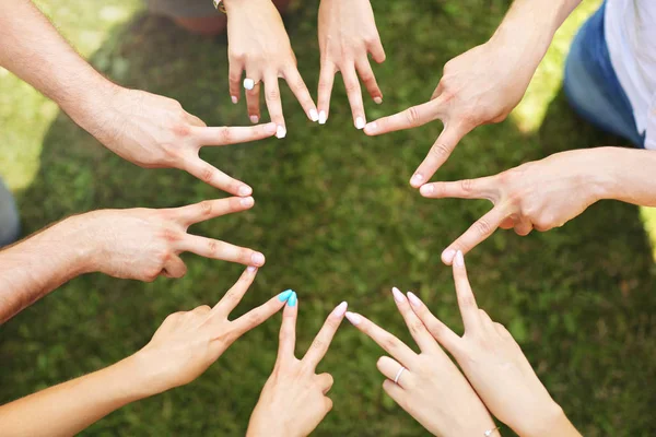 Friends bonding hands together — Stock Photo, Image