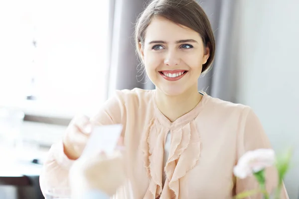 Two Businesspeople Meeting For Lunch In Restaurant