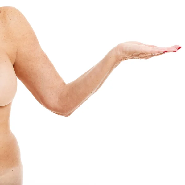 Obeso mulher adulta mostrando braço sobre fundo branco — Fotografia de Stock