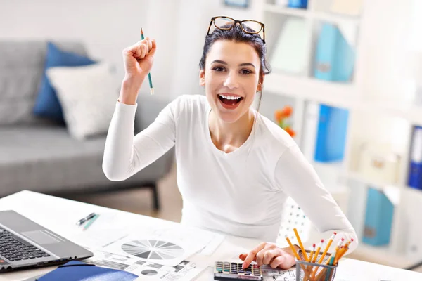 Woman working in her home office — Stock Photo, Image
