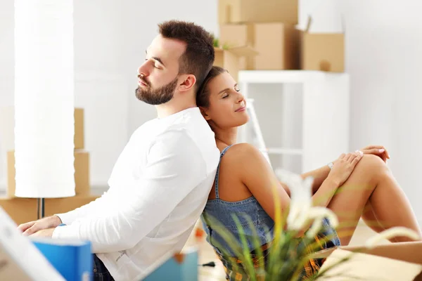 Happy adult couple moving out or in to new home — Stock Photo, Image