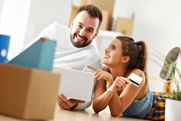 Happy adult couple moving out or in to new home — Stock Photo, Image
