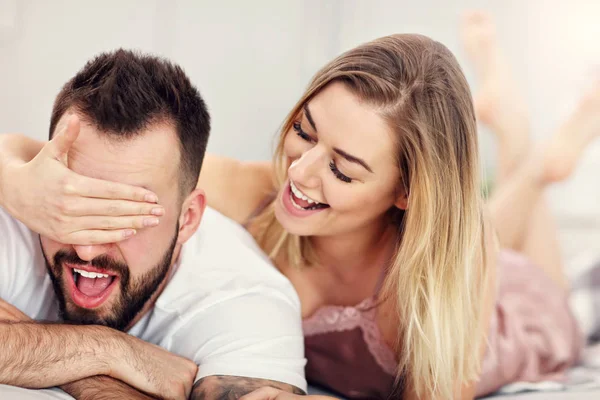 Adult attractive couple in bed — Stock Photo, Image