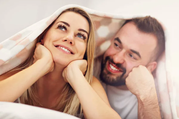 Adult attractive couple in bed — Stock Photo, Image