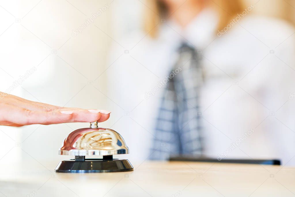 Receptionist at hotel front desk