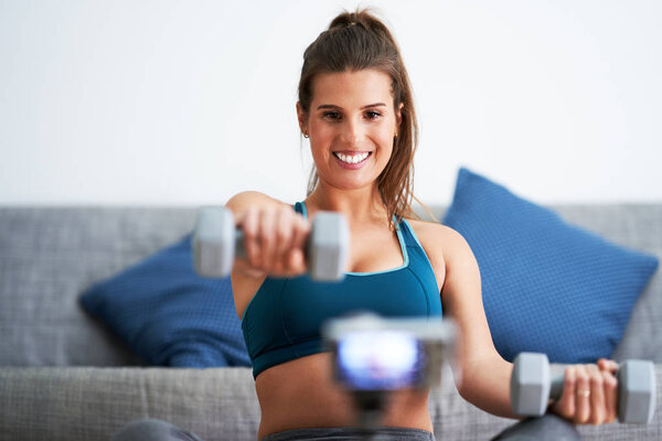 Fitness vlogger influencer recording live tutorial video