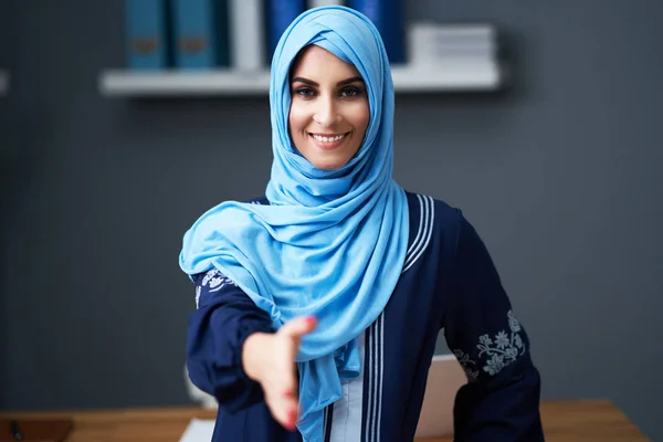 Muslim female student learning at home — Stock Photo, Image