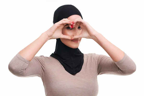 Muslim woman over white background — Stock Photo, Image