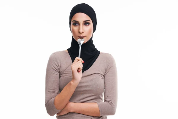 Muslim woman over white background — Stok fotoğraf