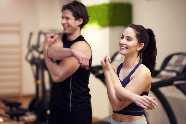 Fit couple at the gym looking very attractive — Stock Photo, Image