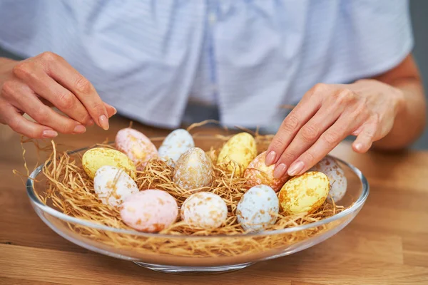 Happy adult woman in Easter mood in the kitchen — Stock Photo, Image