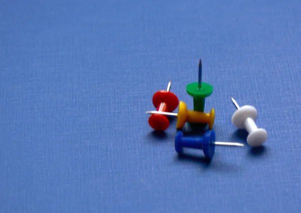 Five Colored Sticks Slipped Blue Cardboard — Stock Photo, Image
