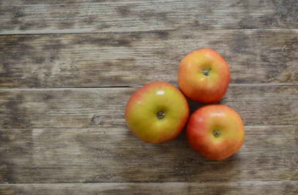 three ecologically pure apples are planted on old wood