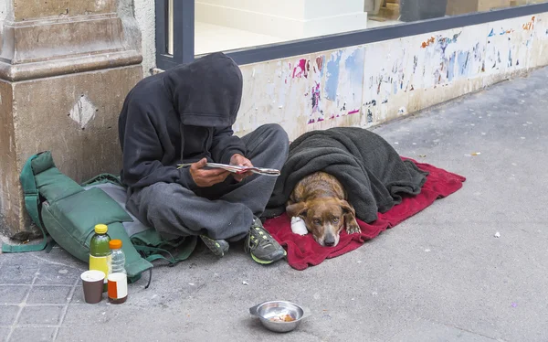 Clochard with dog — Stock Photo, Image