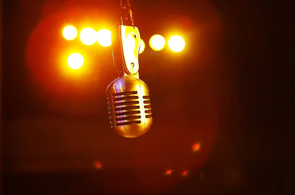 Microphone in the stage lights — Stock Photo, Image