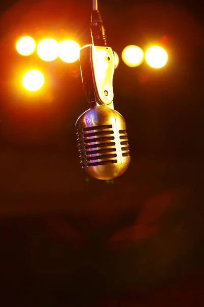 Microphone in the stage lights — Stock Photo, Image