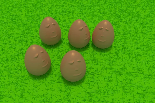 Souriant œufs dorés debout sur l'herbe verte — Photo