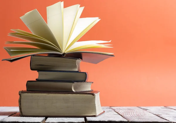 Open book, hardback books on wooden table. Back to school. Copy space — Stock Photo, Image