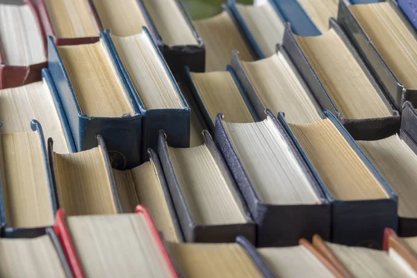 Stack of books background. many books piles. — Stock Photo, Image