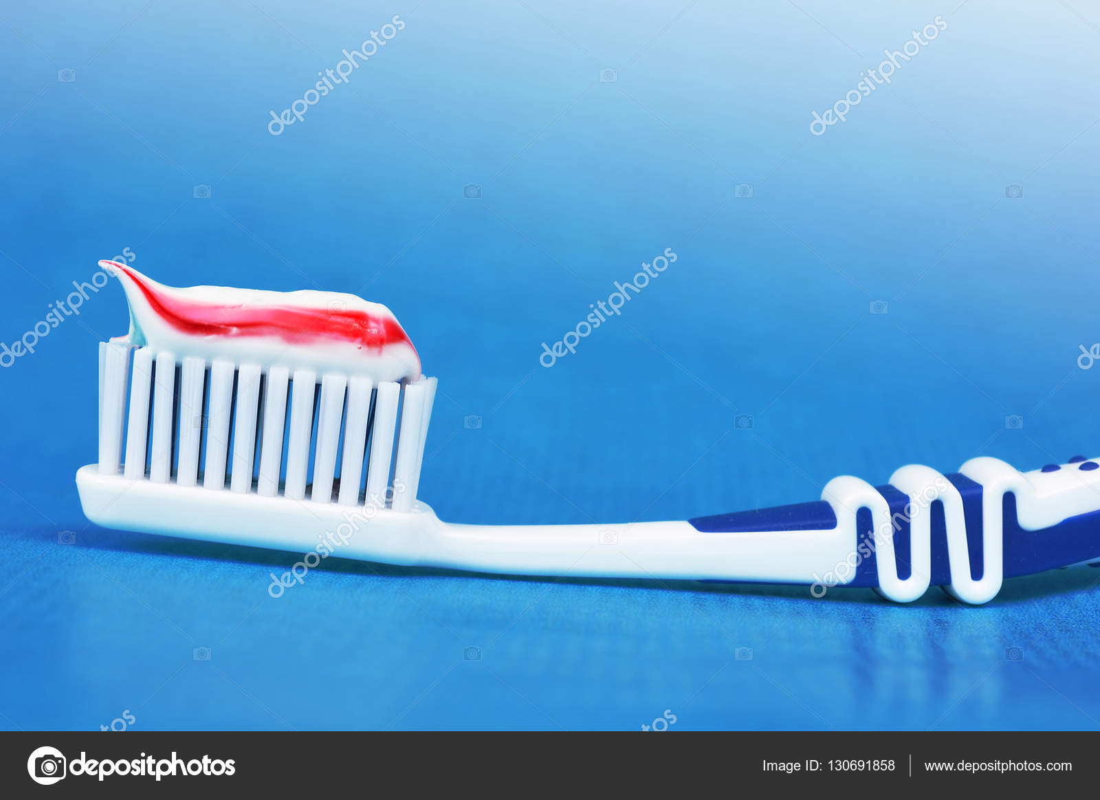 Toothbrush with toothpaste — Stock Photo © nixki 130691858