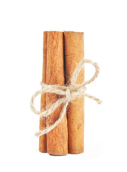 Cinnamon sticks with bow — Stock Photo, Image