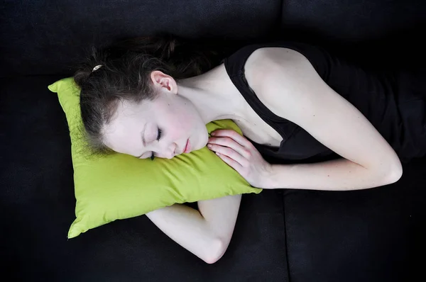 Girl sleeping on a couch
