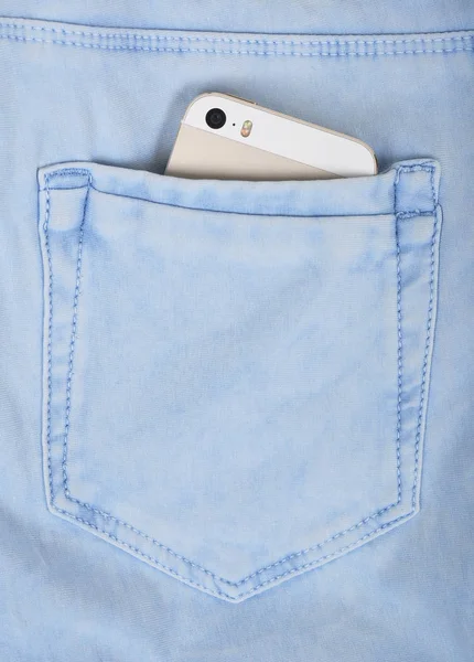 Denim pocket with a smartphone — Stock Photo, Image