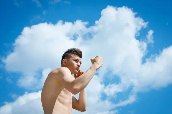 Striking athletic man — Stock Photo, Image