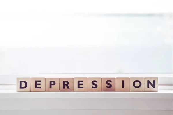 Depression word made om wooden cubes — Stock Photo, Image