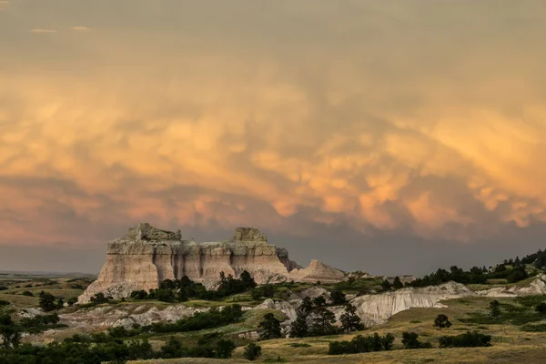 Badlands stormy sunset — Stock Photo, Image