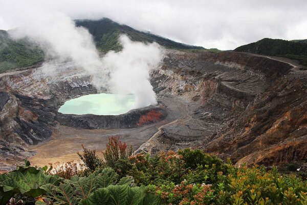 Lake in the Poas volcano crater in Costa Rica