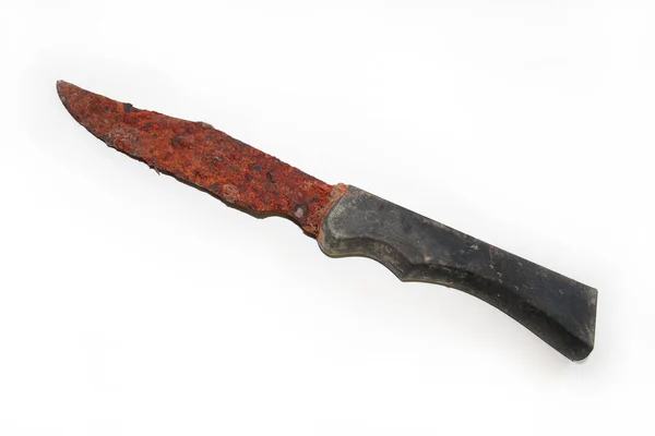 Isolated image of a heavily rusted, fixed blade knife with a black handle. Stock Photo