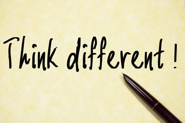Think different text write on paper — Stock Photo, Image
