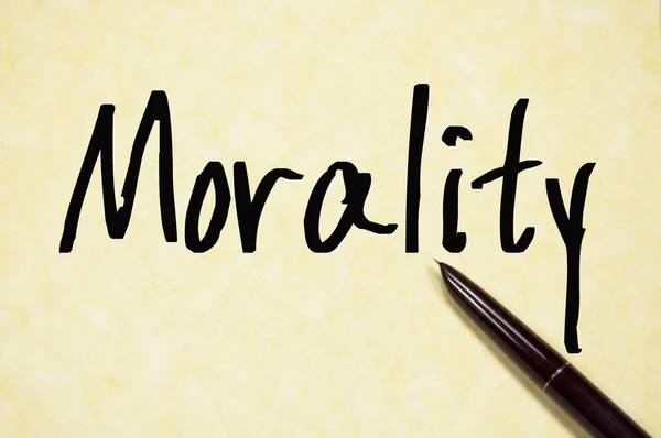 Moraal woord schrijven op papier — Stockfoto