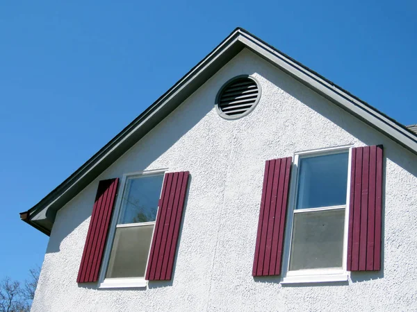 Thornhill windows with red shutters 2017 Stock Photo