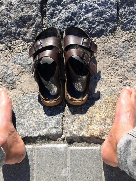 feet and sandals during a rest in summerrtime