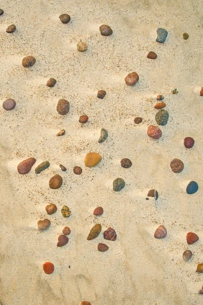 Piedras de guijarro en una playa — Foto de Stock