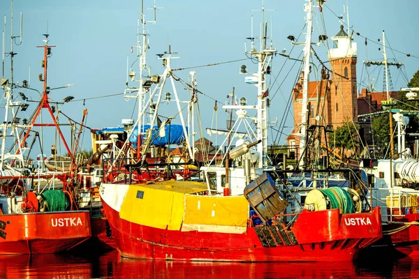 Fishing port of Ustka, Poland with old lighthouse — Stock Photo, Image