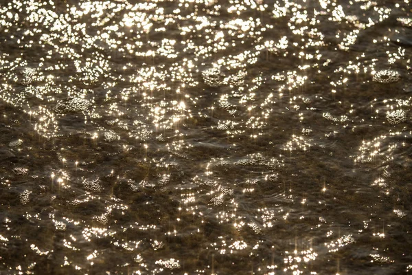 Agua con reflejos solares — Foto de Stock