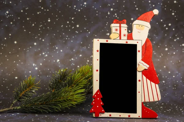 Papai Noel com quadro-negro vazio — Fotografia de Stock