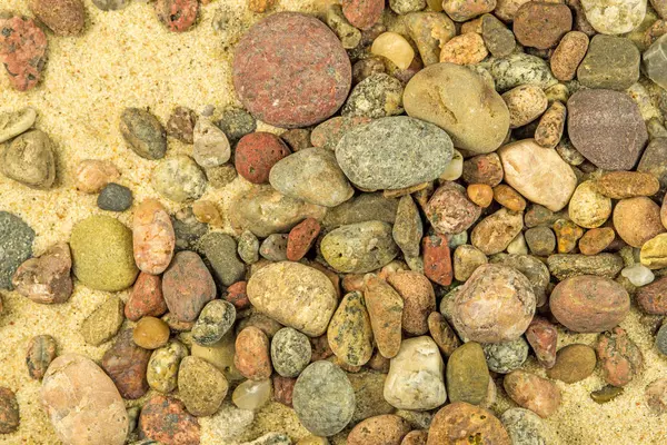 Piedras de guijarro en una playa — Foto de Stock