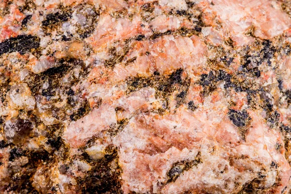 Pegmatite in a macro shot — стоковое фото