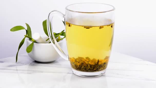 Mistletoe, thé sur une table tournante 