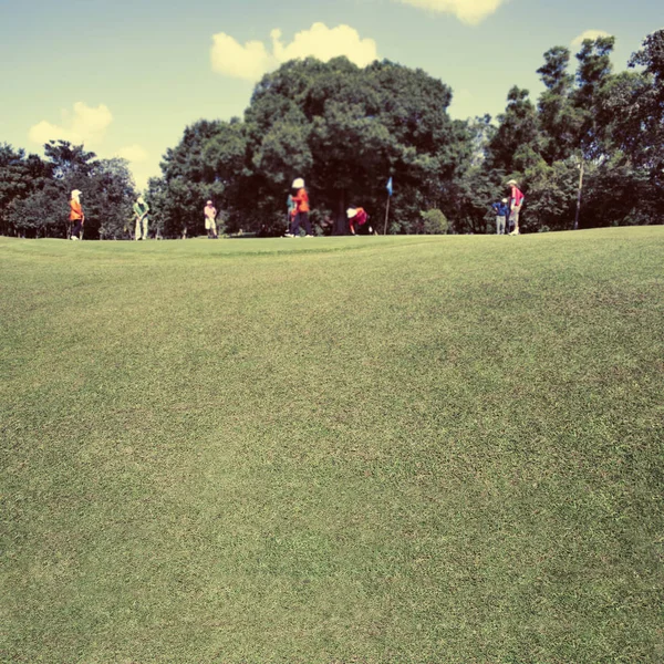 ゴルファーとキャディー ヴィンテージぼやけてイメージの背景 — ストック写真