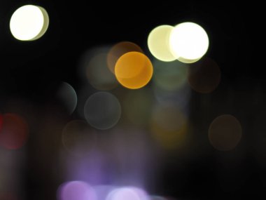 Festive bokeh background, soyut arkaplan ile bokeh sönmüş ışıklar, gece ışığı arka planında Defodaklanmış şehir manzarası