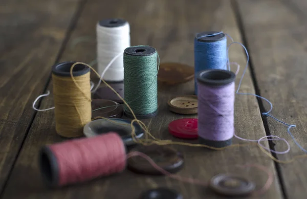 Bobbins with colorful threads — Stock Photo, Image